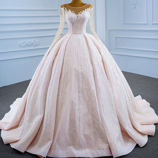 Luxury Beaded Blush Ball Gown Wedding Dress with Long Sleeves