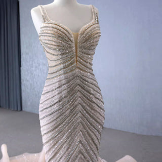 Robe de mariée trompette de luxe avec perles et bretelles spaghetti