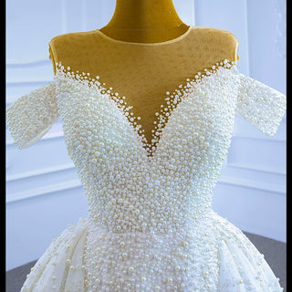 Robe de mariée luxueuse à col haut et perles avec manches amovibles